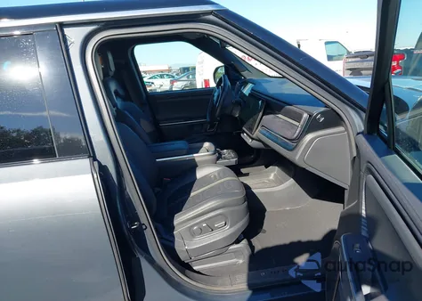 2023 Rivian R1S Adventure from USA, damaged, VIN 7PDSGABA7PN024737